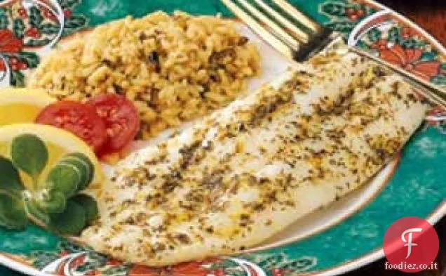Filetti di pesce con burro agli agrumi e alle erbe