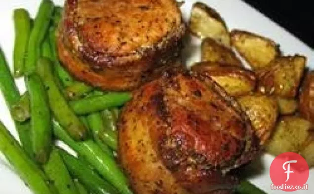 Medaglioni di maiale avvolti in pancetta