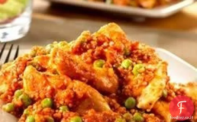 Pollo con piselli e quinoa