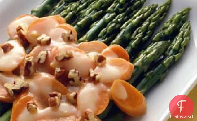 Asparagi e carote glassati con noci pecan