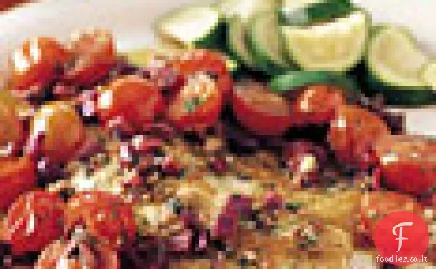 Pesce piccante saltato con olive e pomodorini