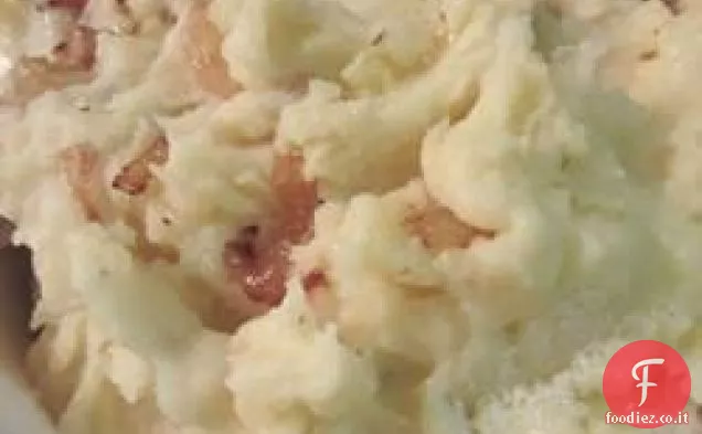 Cipolla caramellata e patate schiacciate al rafano