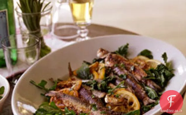 Sardine grigliate su rucola appassita