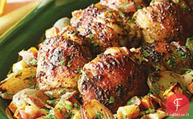 Cosce di pollo brunite con patate dolci arrosto e pastinaca