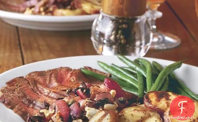 Bistecca alla griglia e patate con cipolla rossa gusto