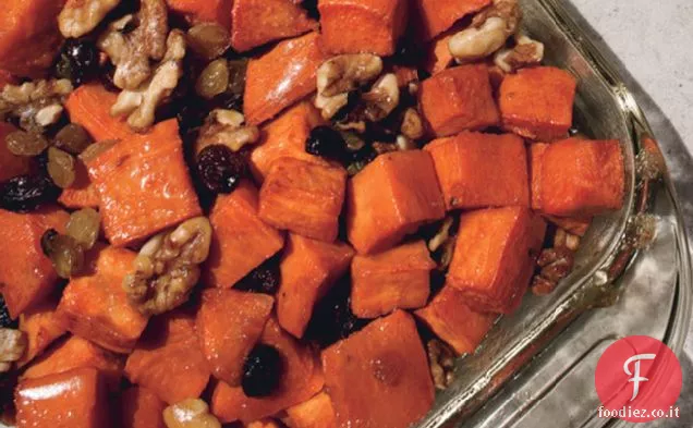 Ignami di granato con sciroppo d'acero, noci e uvetta brandita
