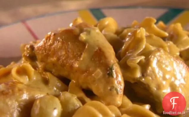 Pollo al curry brandito con uva