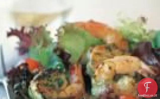 Gamberetti al pesto su verdure miste