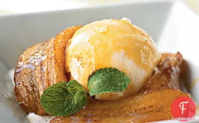 Banane al burro rosolate con salsa di brandy all'arancia