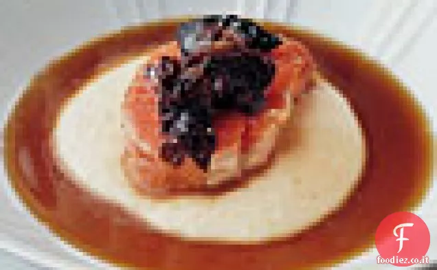 Salmone appena cotto con Polenta di Parmigiano e Consommé di funghi