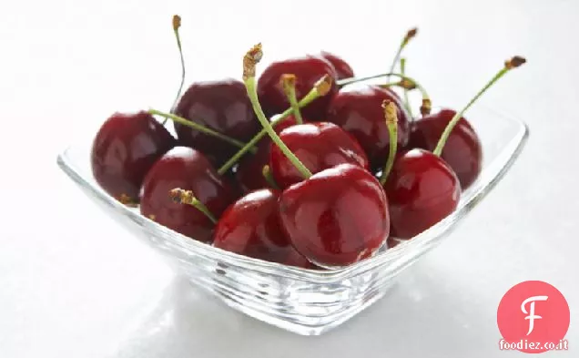 Mousse di cocco con ciliegie imbevute di rum