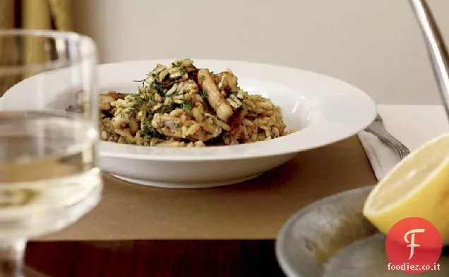 Pilaf di cozze e calamari con spezie dolci e aneto