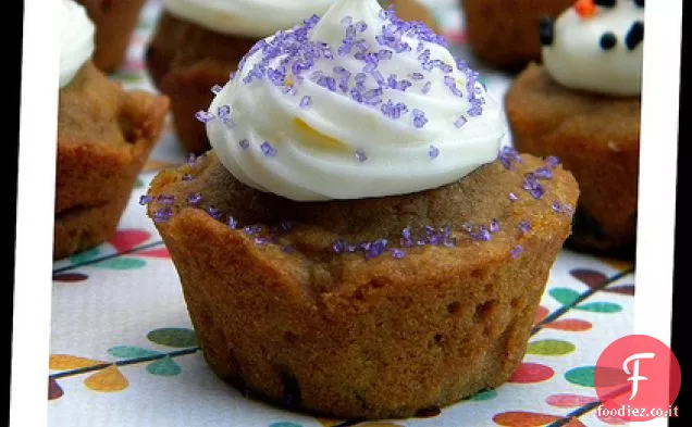 Muffin di pan di zenzero di zucca con glassa di crema di formaggio all'arancia