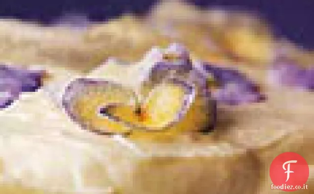 Torta a strati di limone con glassa alla crema di limone