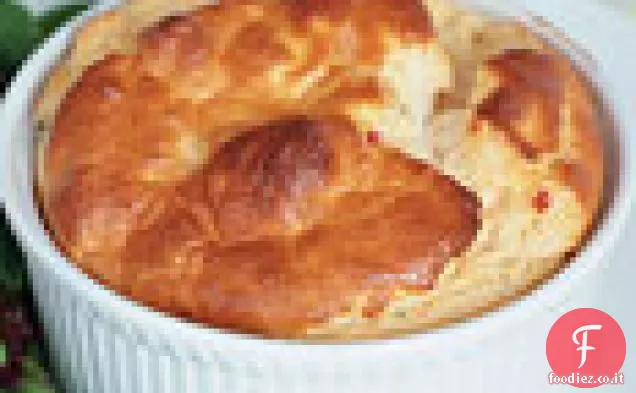 Formaggio di capra, pomodoro essiccato al sole e soufflé di aglio arrostito