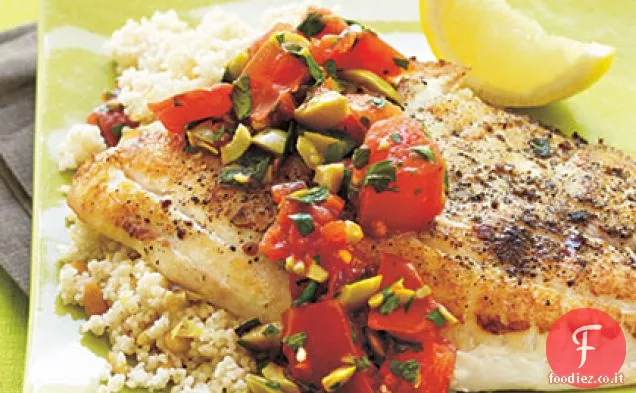 Tilapia con salsa di olive calde