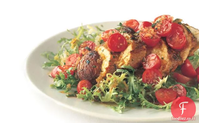 Pollo saltato con Vinaigrette al pomodoro e zafferano su Frisée