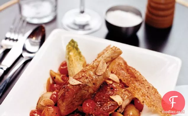 Pollo basco con peperoni dolci e pomodori