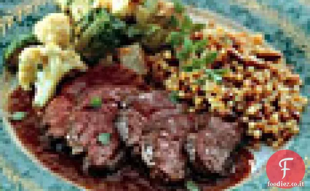 Petti di anatra moscovita con salsa di melograno e vino