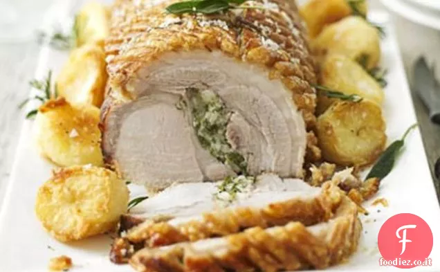Lombo di maiale arrosto con ripieno di burro alle erbe e arrosti