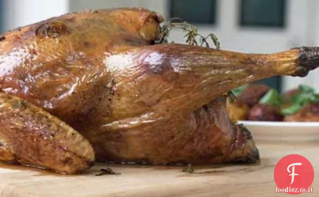 Tacchino con burro di limone e salvia e ripieno di mirtilli e arance