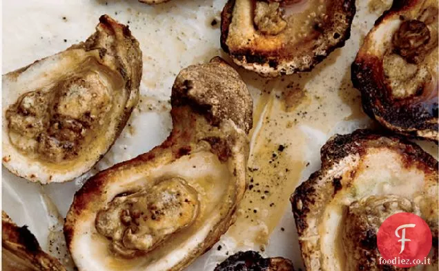 Ostriche alla griglia con burro di dragoncello piccante