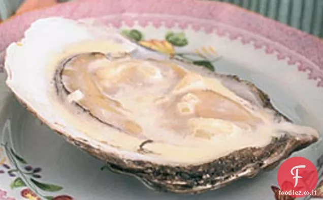 Ostriche calde bagnate con crema e scalogni