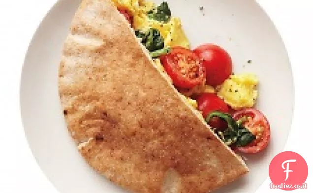 Uova strapazzate con spinaci e pomodori