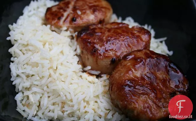 Medaglioni di maiale di soia, miele e pepe di Schezuan con riso fritto all'uovo