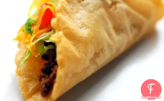 Tacos gonfi ripieni di carne macinata