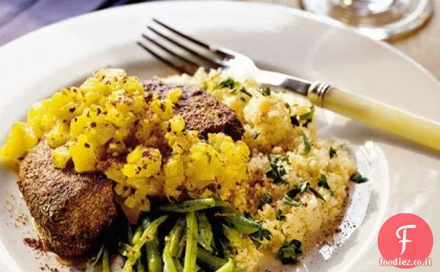 Braciole di maiale con salsa di ananas caldo