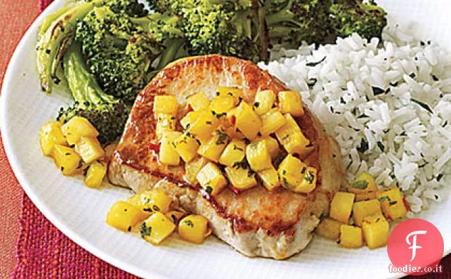Braciole di maiale saltate con ananas e menta