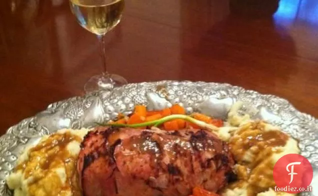 Lombo di maiale incrostato di prosciutto