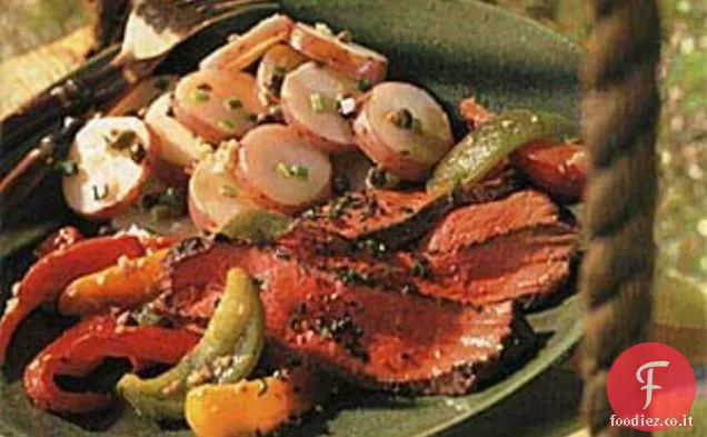 Bistecche alla griglia con peperoni arrostiti