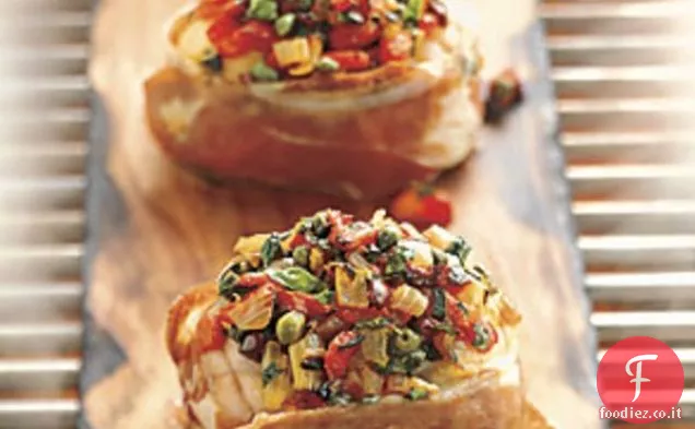 Rana Pescatrice in legno di Cedro con gusto alla Puttanesca e arrosto al fuoco