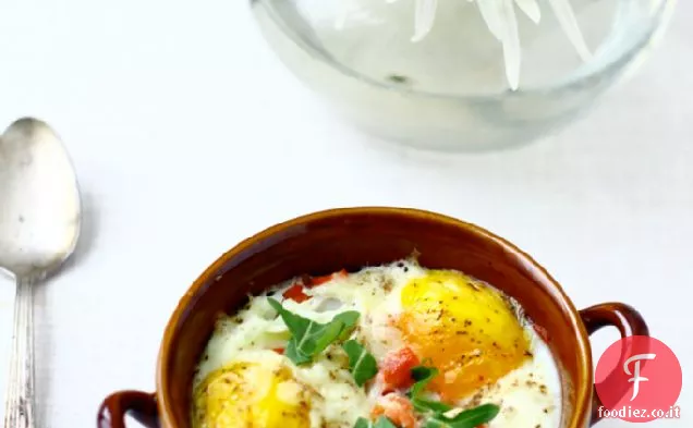 Uova al forno con Salmone affumicato, rucola e Manchego