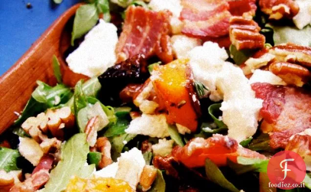 Zucca arrosto e insalata di rucola con noci pecan, pancetta, E capra C