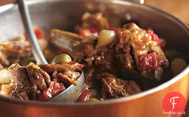 Petto di vitello brasato con erbe, Pernod e pomodori