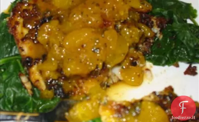 Tilapia con salsa di arancia