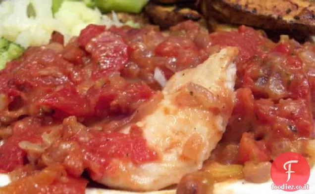 Pesce al forno con pomodori