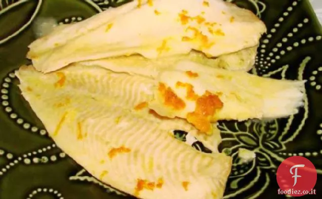 Pesce al forno con salsa all'arancia