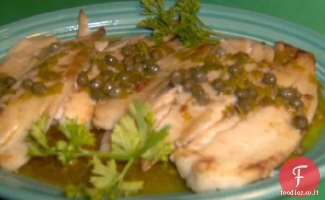 Pesce alla griglia con salsa di capperi burrosa