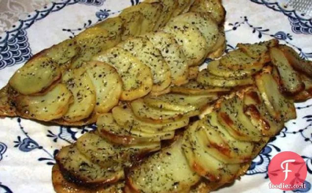Filetti di merluzzo marinato con scaglie di patate