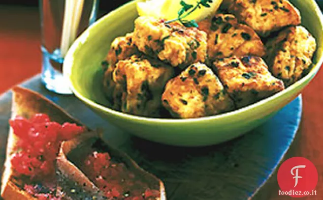 Pesce fritto marinato in aglio, aceto, origano e cumino