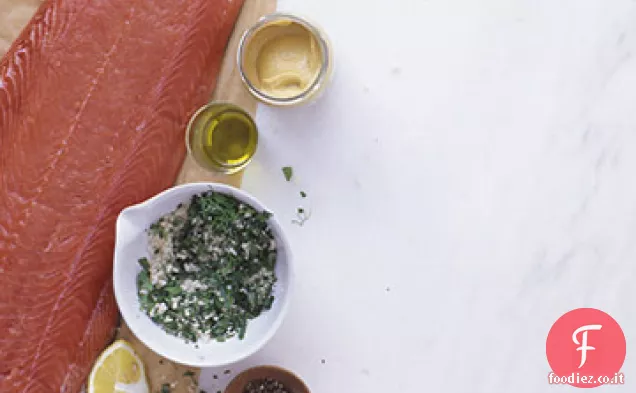 Salmone in crosta di erbe con limoni arrostiti