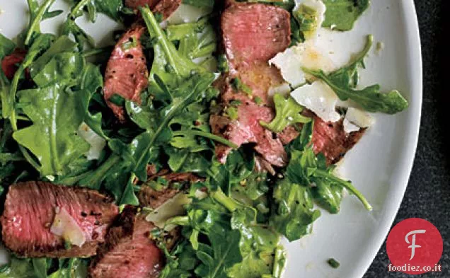 Bistecca alla griglia con rucola e insalata di parmigiano