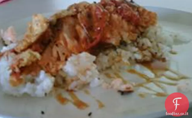 Salmone, riso e pomodori fritti