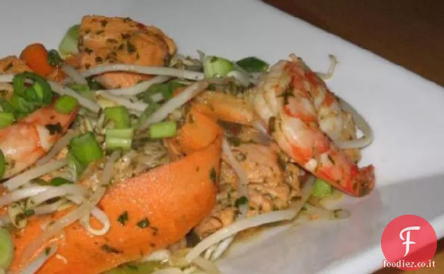 Gamberi e salmone soffriggere con citronella e menta