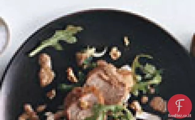 Filetto di maiale con indivia rucola e Vinaigrette di noci