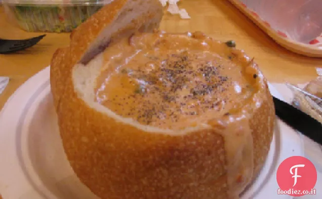 Zuppa di salmone al pomodoro affumicato